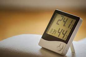 Digital thermometer displaying room temperature measurement